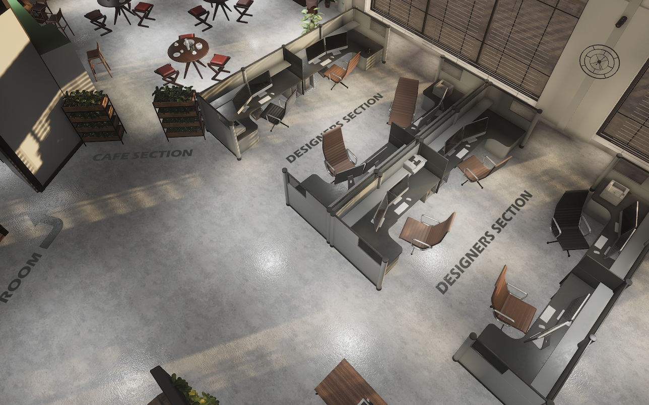 Open-plan designers section with cubicles, dual monitors and office chairs